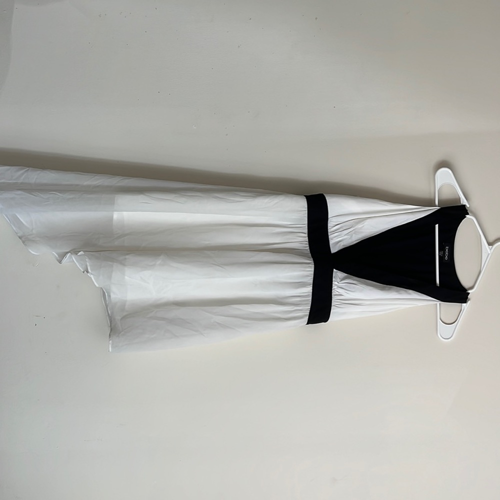 Bebe cute dress high low with cutouts on the back Size Small